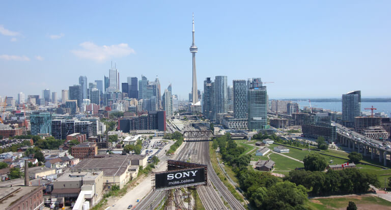 Toronto showing the CN Tower and highway, and so many other buildings. Though and, first of all, also, another, furthermore, finally, in addition because, so, due to, while, since, therefore the same and so no. While it's less, rather, while, yet, and so opposite in many ways.