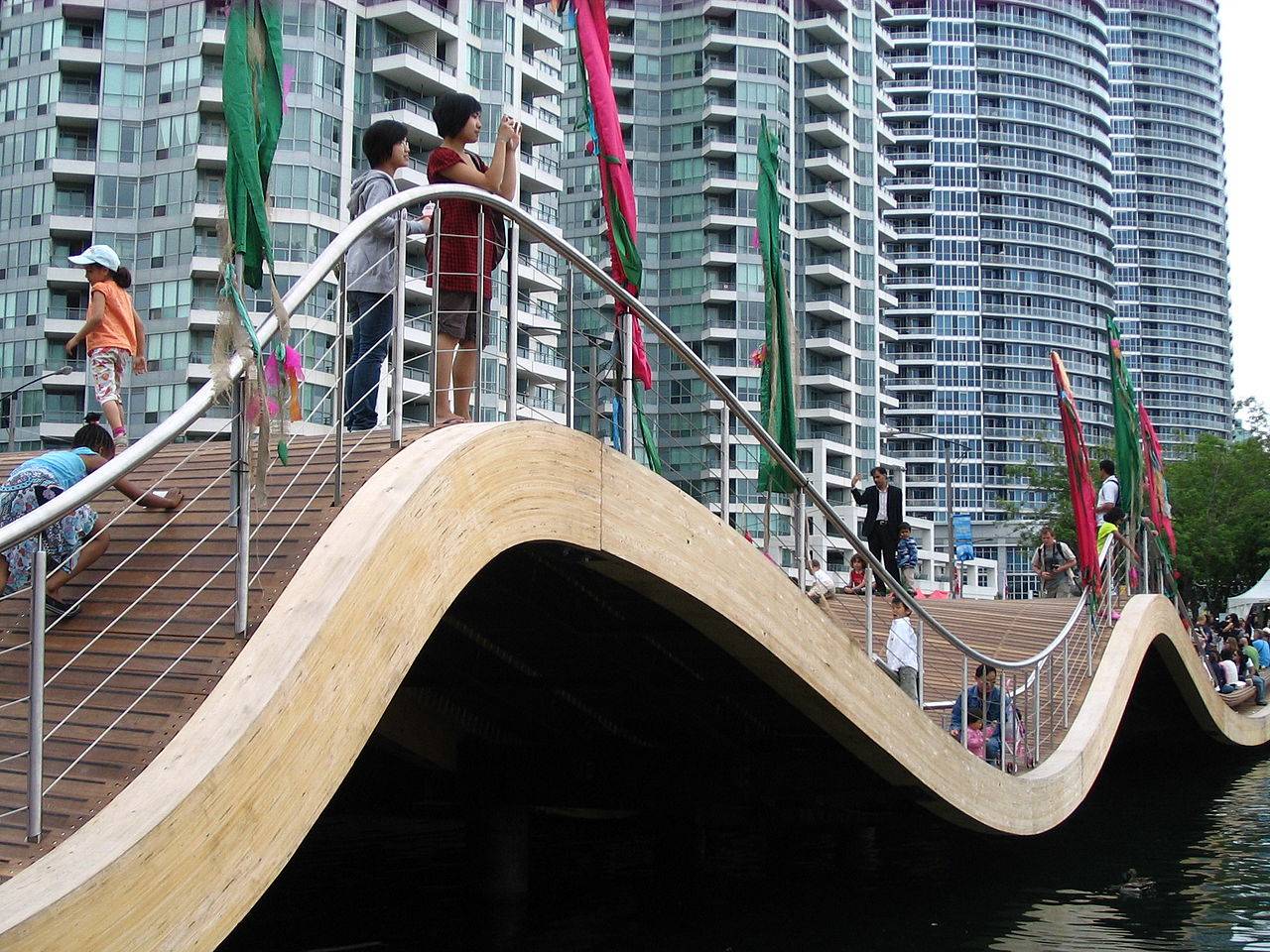 Simcoe Wave Deck on the Toronto Harbour. And first of all, also, another, furthermore, finally, in addition because, so, due to, while, since, therefore.