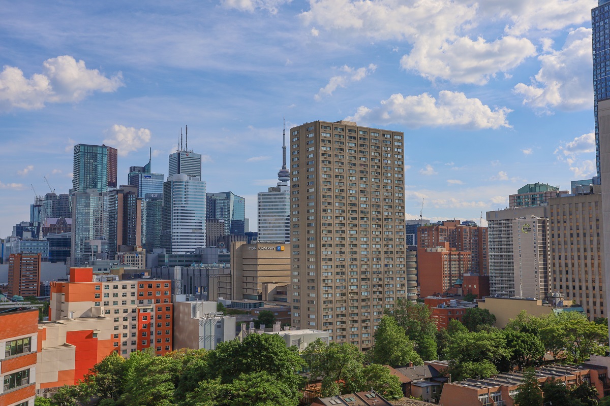 Daytime view of Toronto skyline and landmarks like the CN Tower.