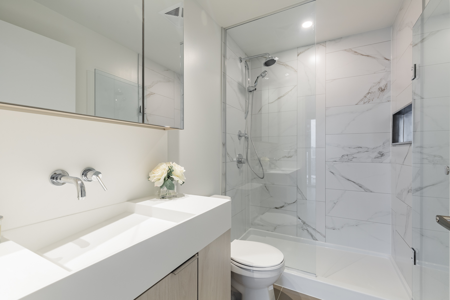 20 Richardson St 3 piece ensuite bath marble tiles built in vanity Beautiful ensuite bath with glass shower, vanity and marble tiles.
