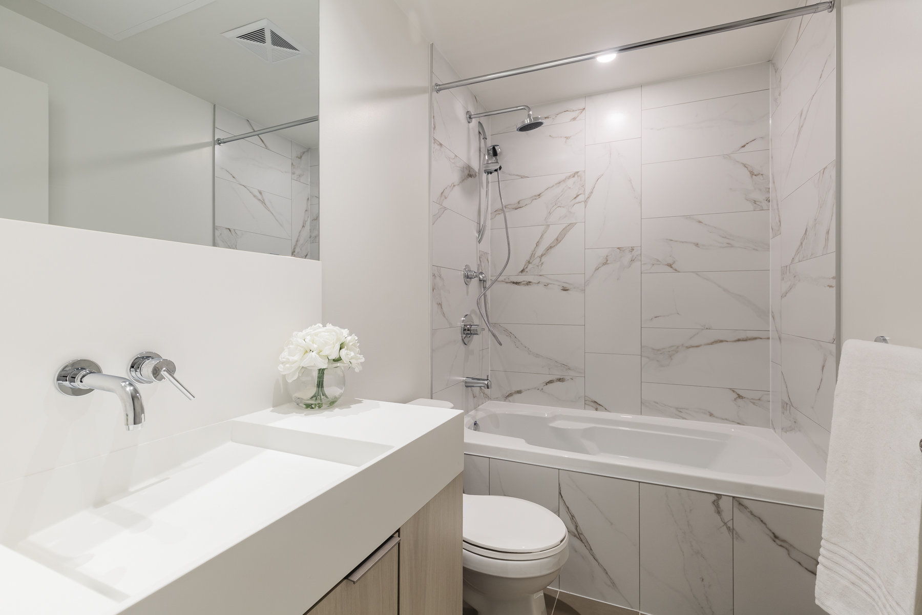 20 Richardson St Unit 3018 second bath soaker tub marble tiles 20 Richardson St Suite 3108 second bedroom with soaker tub and beautiful marble tiles.