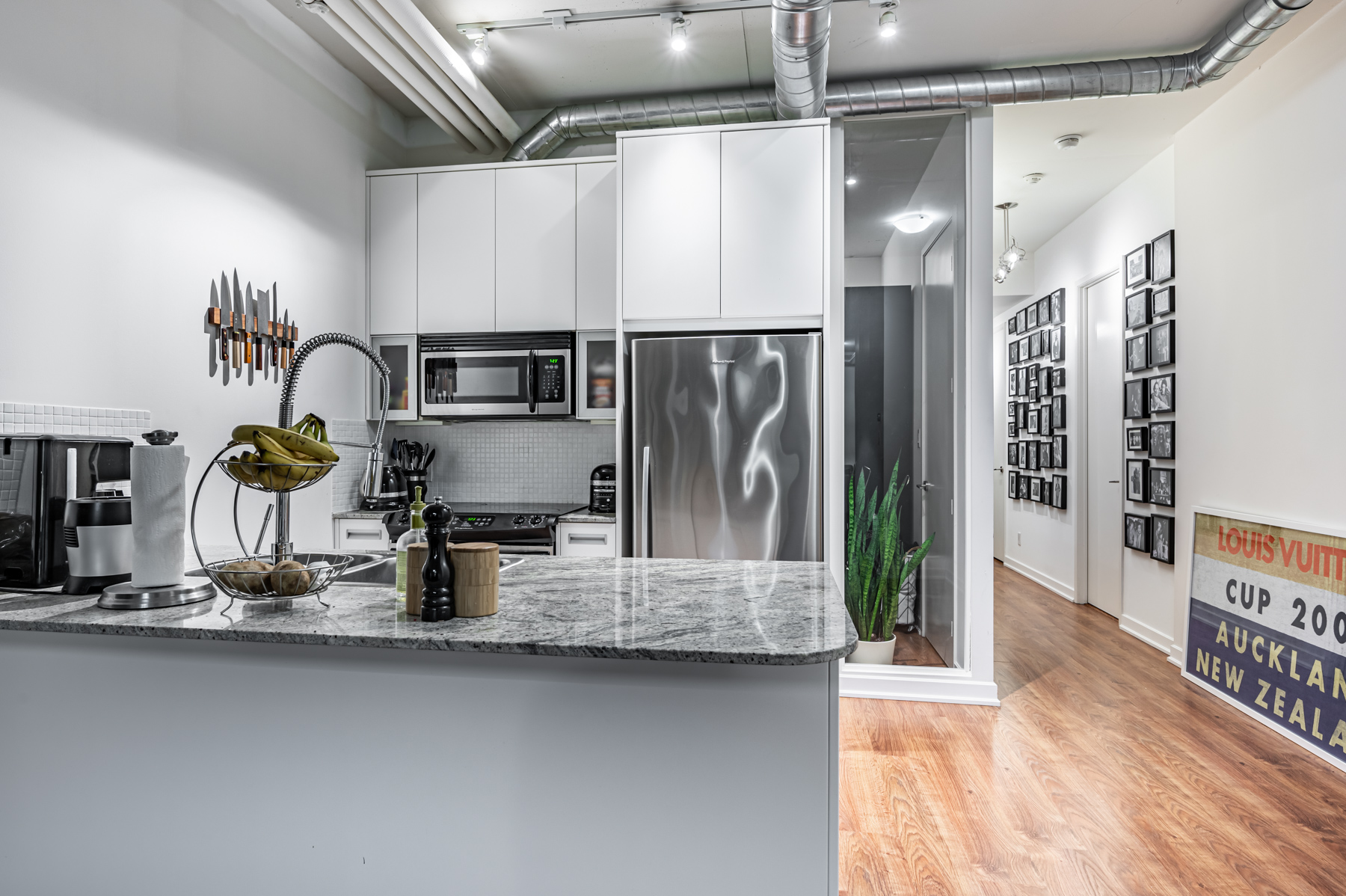 modern kitchen gray silver 380 Macpherson Ave Unit 517 Big, stylish kitchen with gray colour scheme.