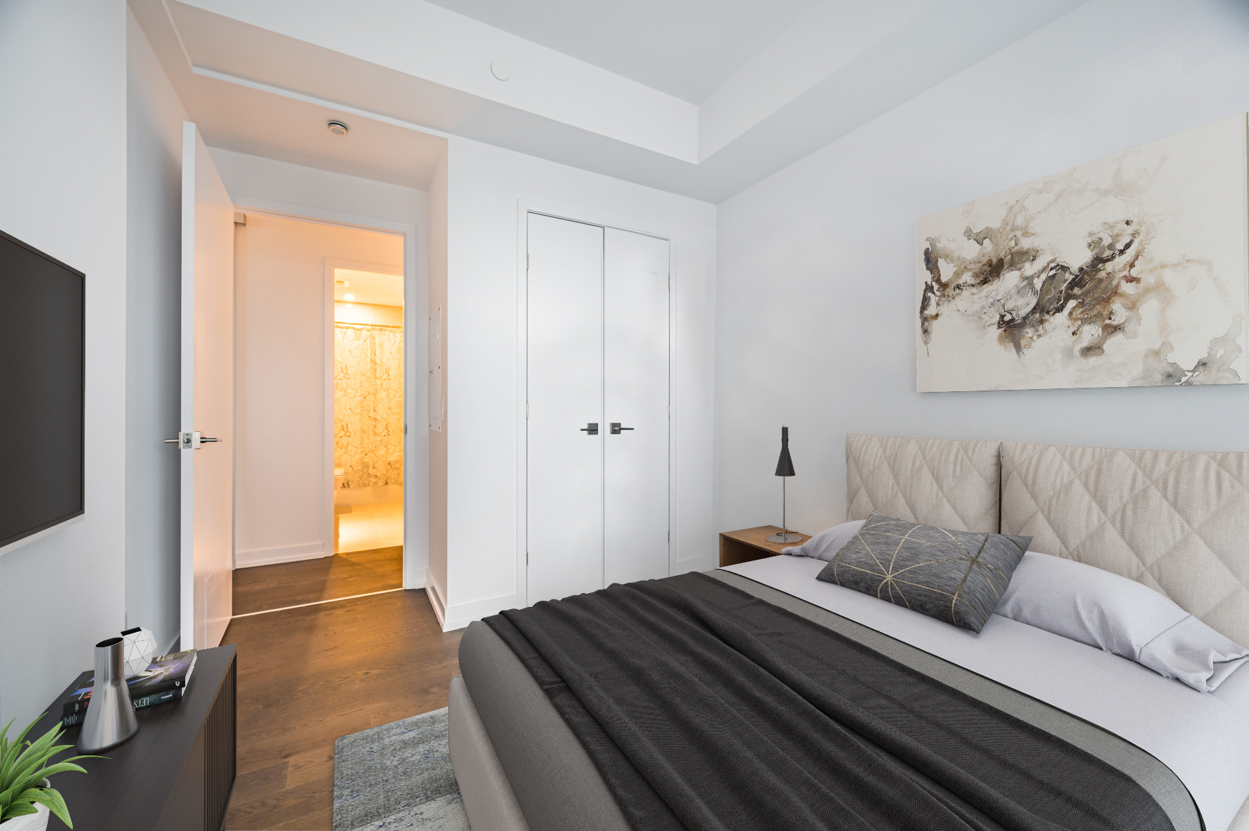 condo second bedroom virtually staged furniture hardwood floors big closet Condo bedroom with hardwood floors, gray walls and large closet.