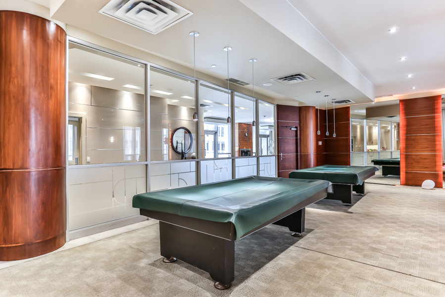 college park north tower rec room billiards table empty Empty condo rec centre with billiards tables.