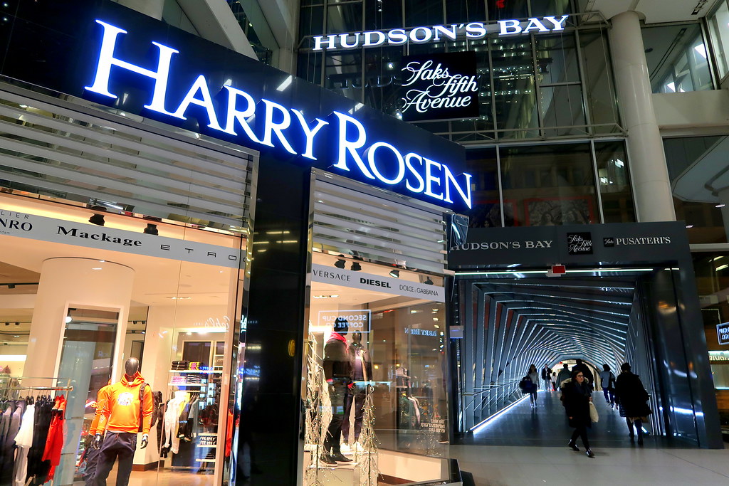 Harry Rosen, Saks Fifth Avenue and Hudson's Bay storefronts at Toronto Eaton Centre.