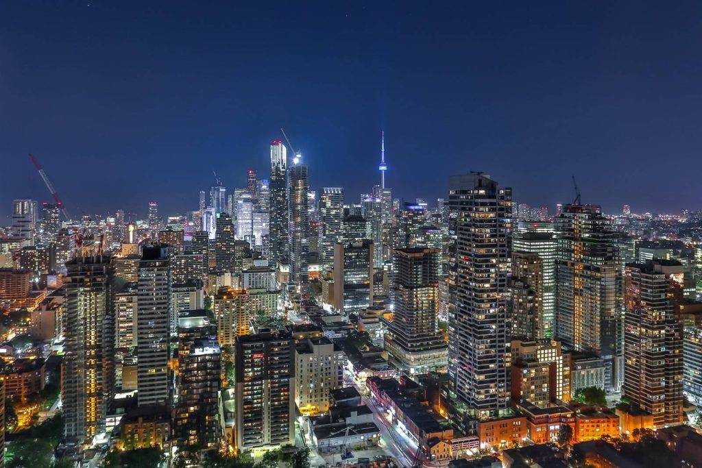 Night view of Toronto real estate landscape.