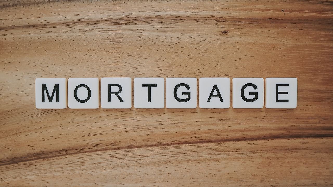 Scrabble tiles spelling the word "mortgage"