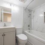 Newly renovated bathroom with porcelain floors – 120 St Patrick Unit 807.