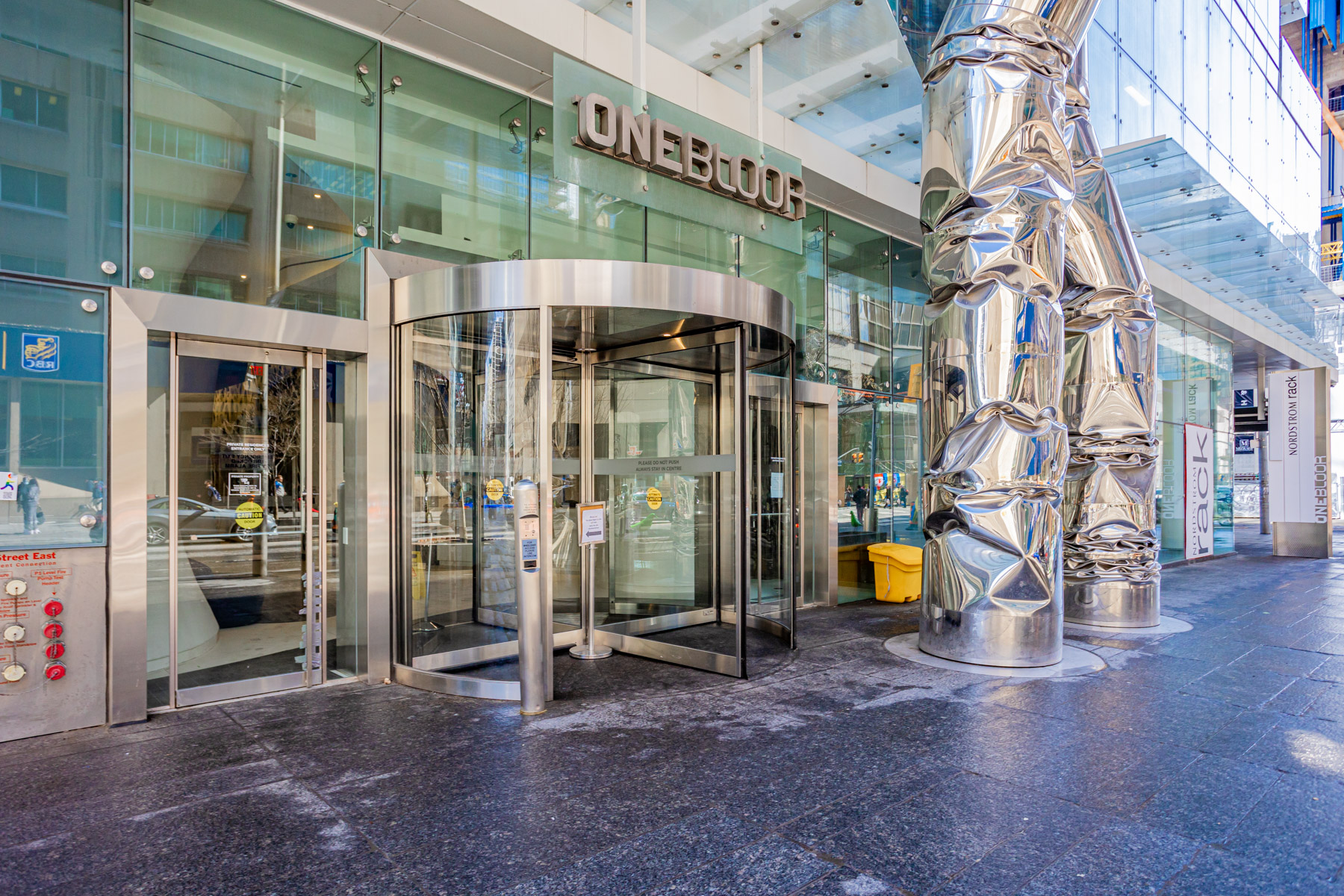 One Bloor entrance with 2 silver columns.
