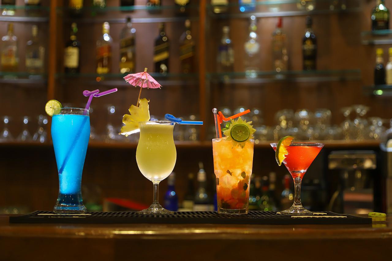 Colourful cocktails on a bar counter.