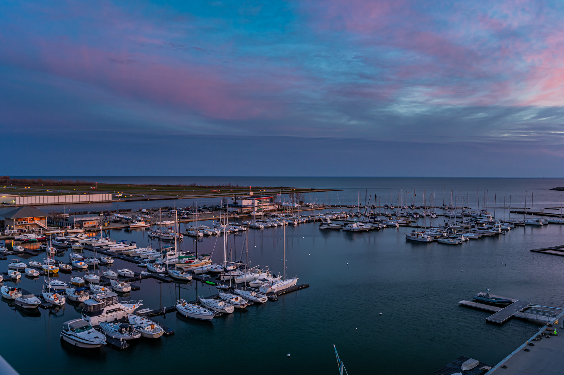 22. Boats on Lake Ontario at sunset Boats and Lake Ontario during evening seen from 90 Stadium Rd #824 balcony.