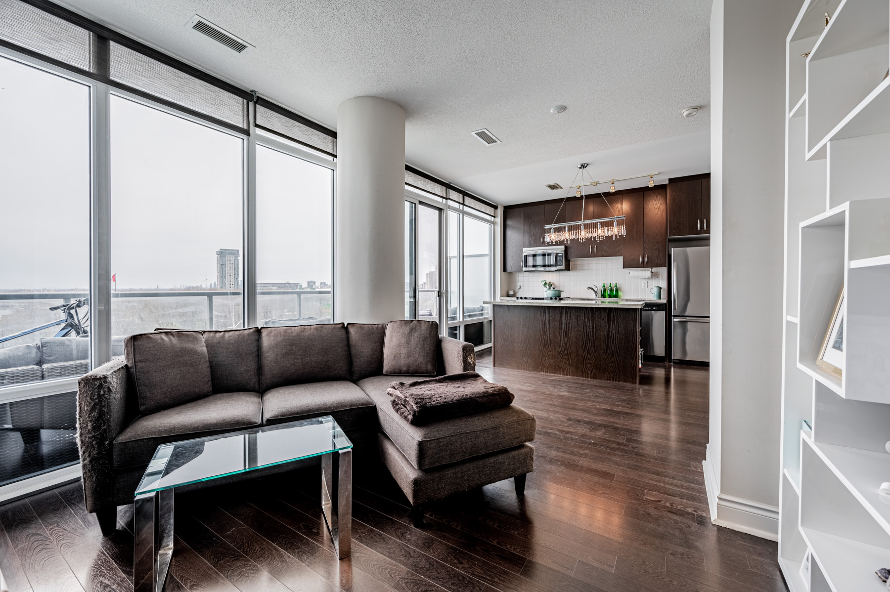 Open-concept living and dining room of 90 Stadium Rd Unit 824.