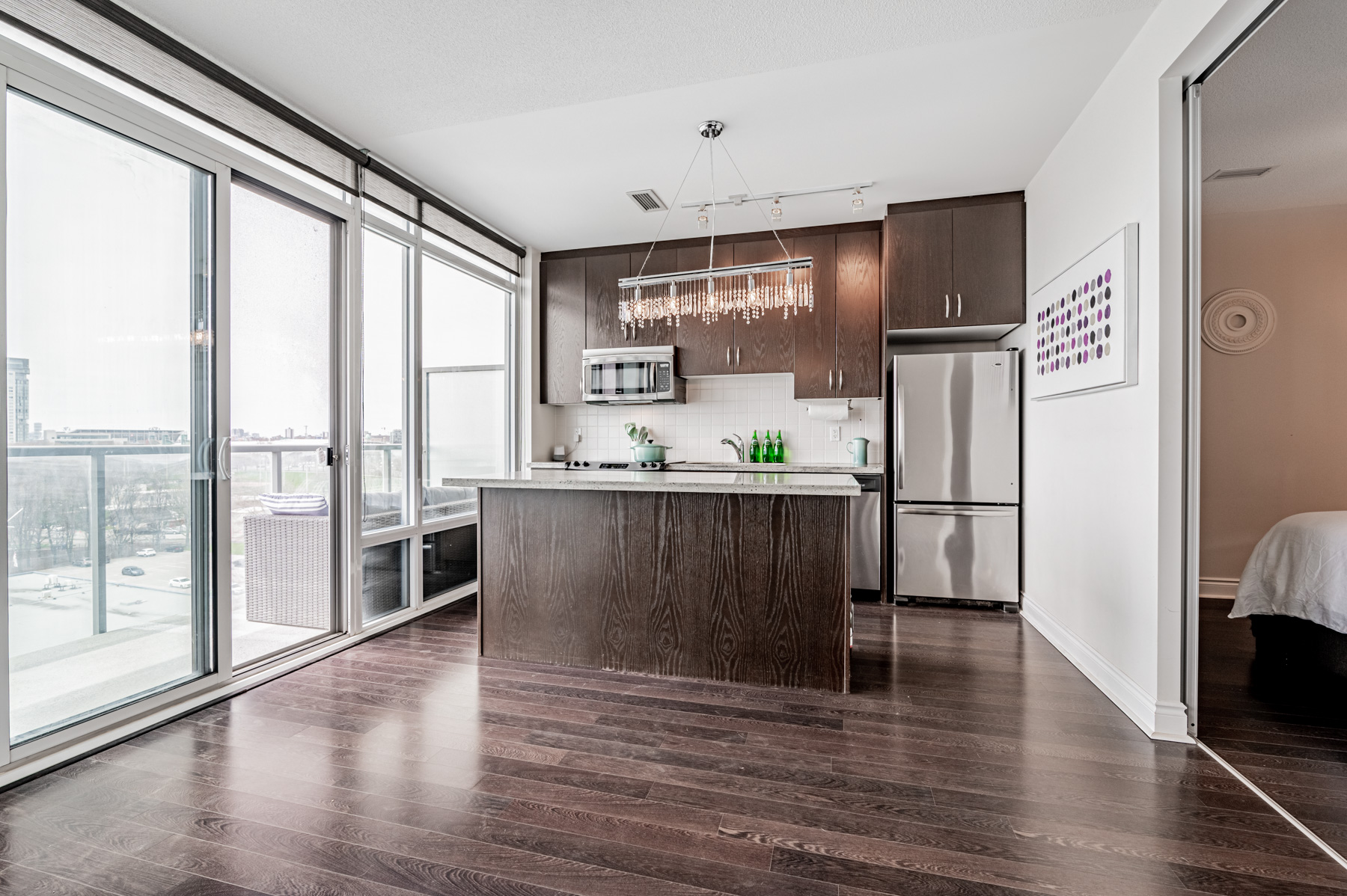 5. dark laminate floors and kitchen cabinets Living room dark laminate floors.