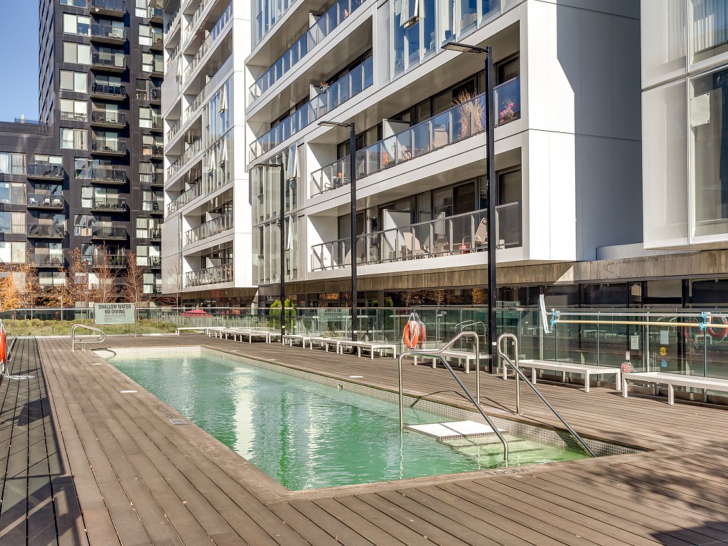 Outdoor swimming pool amenity – River City 2 condo.