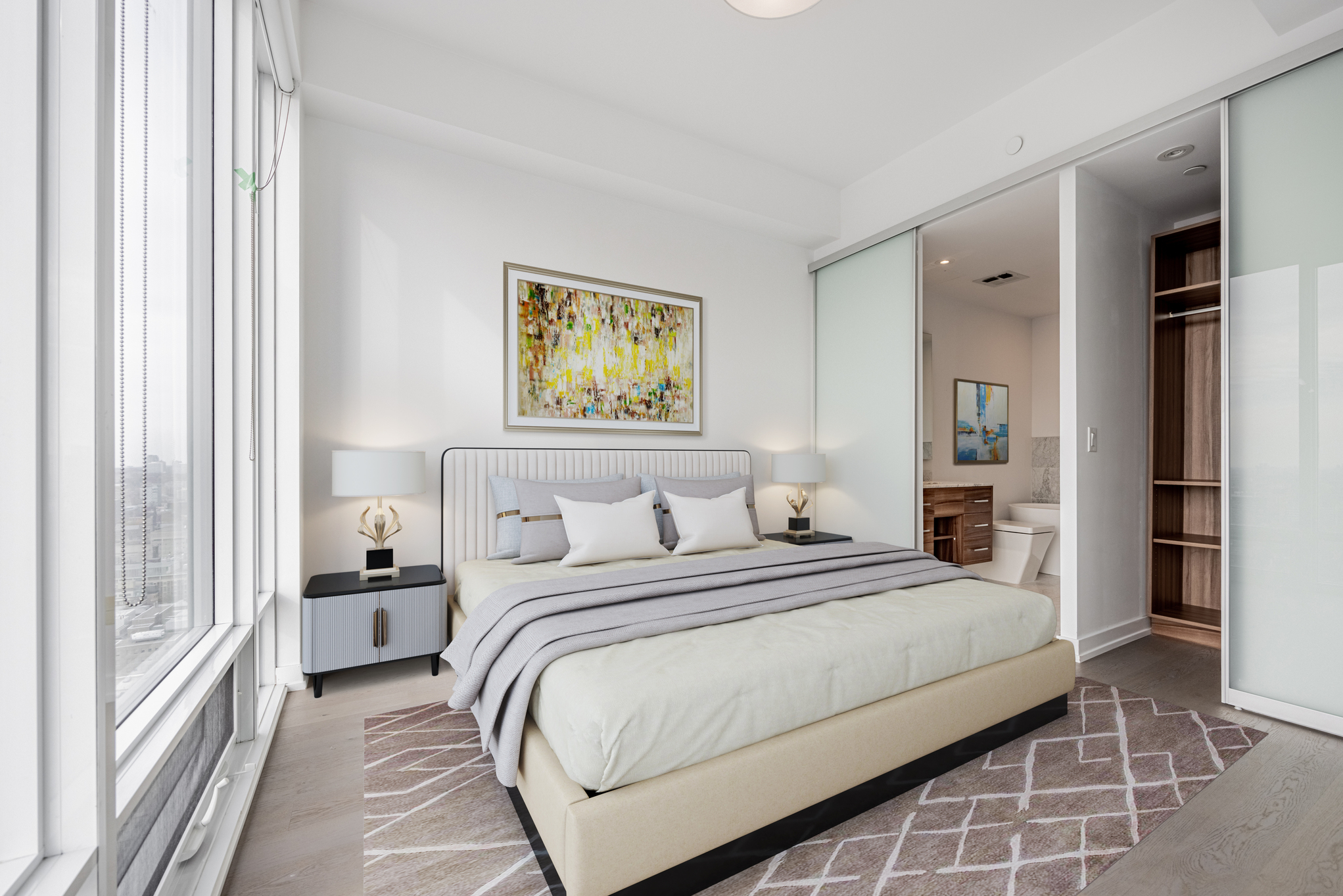 Spacious, well-lit primary bedroom – 488 University Ave Unit 2710.